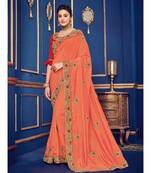 orange embroidered silk blend saree with blouse