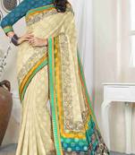 Cream printed brasso saree with blouse