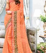 Peach printed brasso saree with blouse