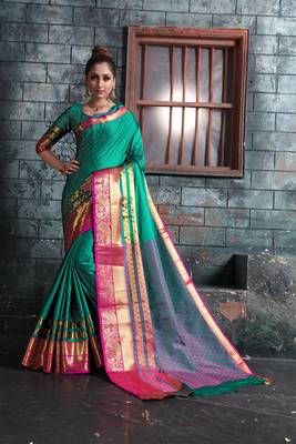 Green woven art silk saree with blouse 1