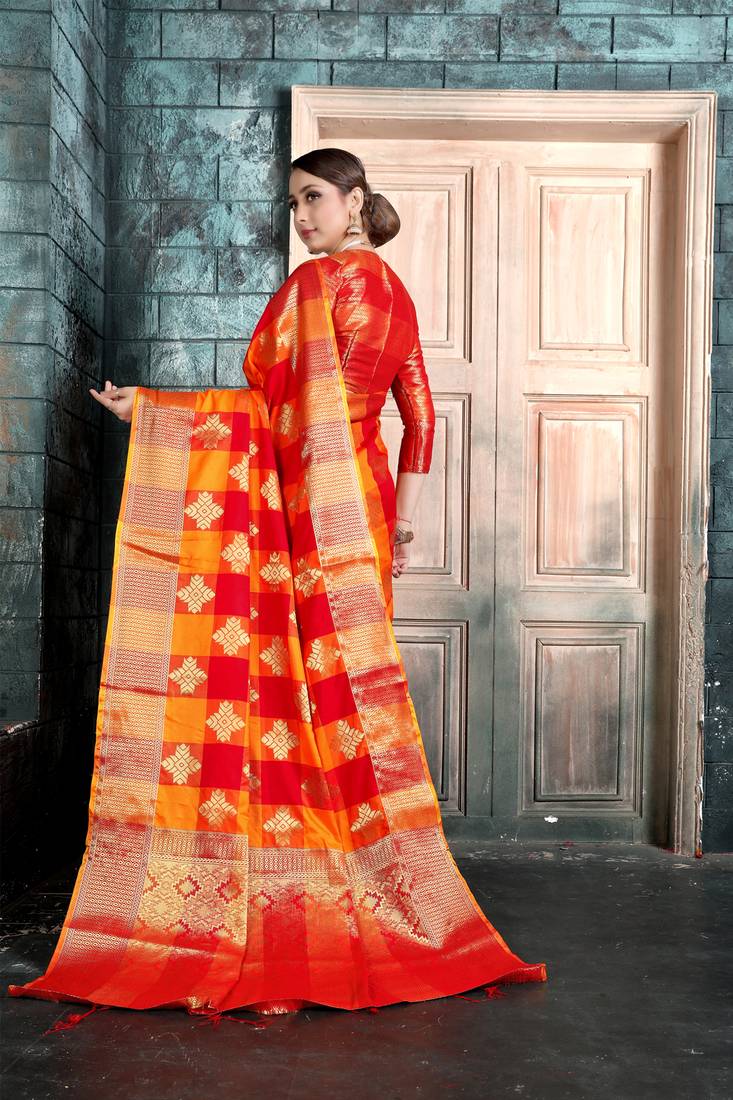 Red Banarasi Embroidered saree paired with unstitched blouse