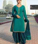 Turquoise embroidered crepe salwar