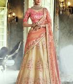 Cream thread embroidery art silk semi stitched lehenga