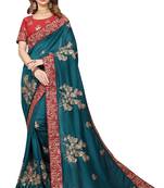 Turquoise embroidered satin saree with blouse