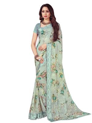 Green printed chiffon saree with blouse 1