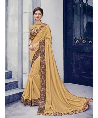golden embroidered silk blend saree with blouse 1