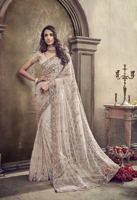 Ivory embroidered net saree with blouse 1