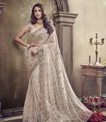 Ivory embroidered net saree with blouse