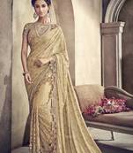 Light yellow embroidered net saree with blouse