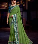 Green embroidered satin saree with blouse
