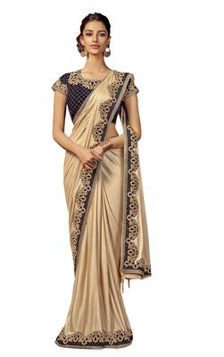 Cream embroidered lycra saree with blouse 1