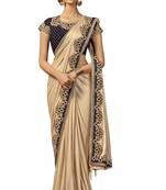 Cream embroidered lycra saree with blouse