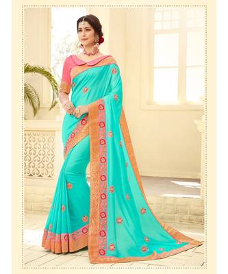 green embroidered satin saree with blouse 1