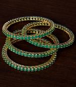 Emerald Stone Embellished Brass Made Two Pairs of Designer Bangles