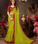 Green printed georgette saree with blouse