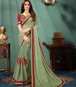 Green printed chiffon saree with blouse
