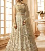 Beige embroidered net semi stitched salwar with dupatta