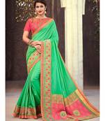 green embroidered silk blend saree with blouse