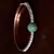 Rose Gold Plated Emerald Stone and Diamond Embellished Light Weight Bracelet