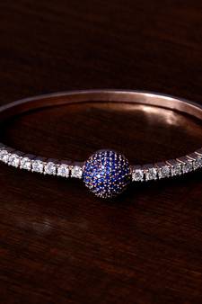 Rose gold plated sapphire stone and diamond embellished light weight bracelet