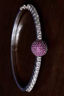 Rhodium plated ruby stone and diamond embellished light weight bracelet