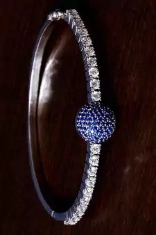 Rhodium plated sapphire stone and diamond embellished light weight bracelet