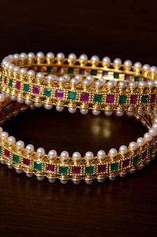Ruby, Emerald and Pearls Embellished Gold Plated Pair of Designer Bangles
