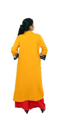 Yellow printed rayon kurtas-and-kurtis 5