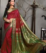 Maroon hand woven silk blend saree with blouse