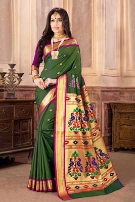 Green hand woven silk blend saree with blouse 2