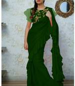   green embroidered silk saree with blouse