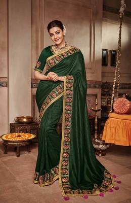 Dark green embroidered satin saree with blouse 1