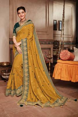 Mustard embroidered satin saree with blouse 1