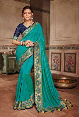 Teal embroidered satin saree with blouse 1