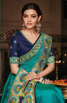 Teal embroidered satin saree with blouse 2