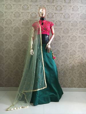 Green plain satin semi stitched lehenga 1
