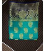 green paisley motif kanchipuram saree with blouse