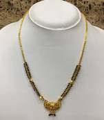 Golden Pendant With Latkan Gold Black Mani Beads Single Line Layer Short Chain Mangalsutra