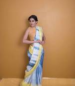 Lemon Yellow And Royal Blue Shaded Saree With Pom Poms In Khadi Silk
