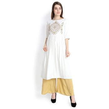 Cream embroidered rayon kurtas and kurtis 1