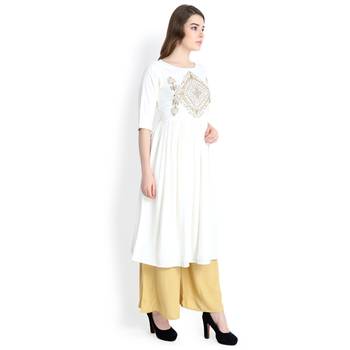 Cream embroidered rayon kurtas and kurtis 3