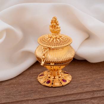 Golden Kumkum Dabbi with Laxmi idol one gram gold 1