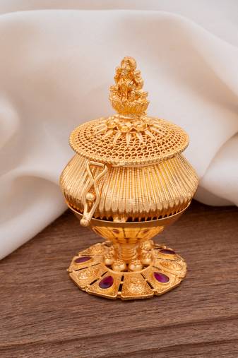 Golden Kumkum Dabbi with Laxmi idol one gram gold
