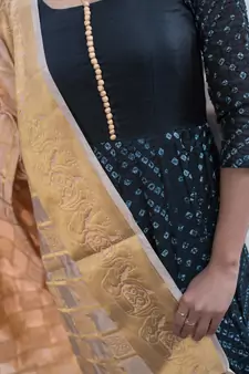 black bandhani print anarkali with golden dupatta