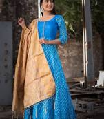 blue bandhani anarkali with golden dupatta