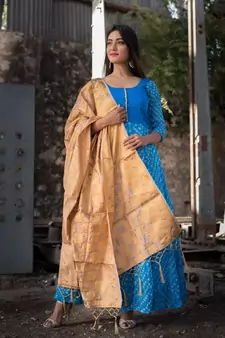 blue bandhani anarkali with golden dupatta