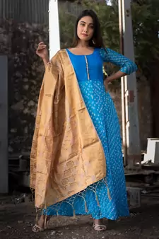 blue bandhani anarkali with golden dupatta