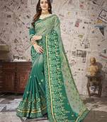 Green embroidered chiffon saree with blouse