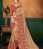 Beige embroidered silk saree with blouse