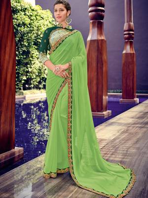 Green embroidered chiffon saree with blouse 1